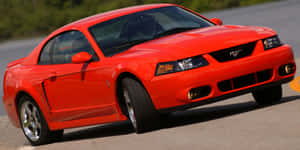 Red Ford Mustang S V T Cobra On Road Wallpaper