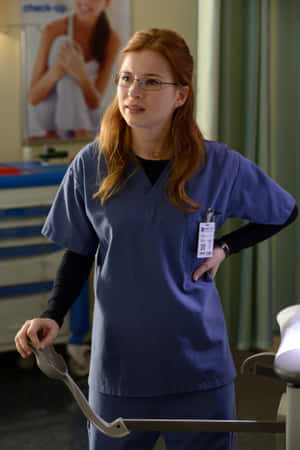 Red Haired Nursein Scrubs Wallpaper