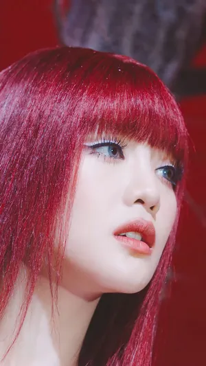 Red Haired Woman Gazing Upward Wallpaper