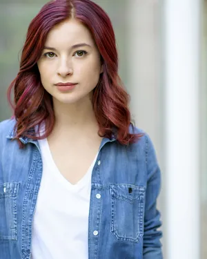 Red Haired Womanin Denim Jacket Wallpaper