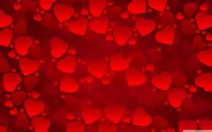 Red Hearts On A Red Background Wallpaper