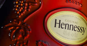 Red Hennessy Bottle With Carvings Wallpaper