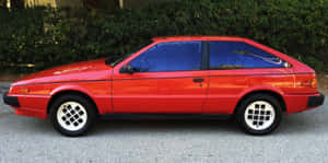 Red Isuzu Impulse Side View Wallpaper
