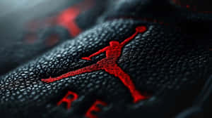 Red Jumpman Logo Embossed Leather Wallpaper