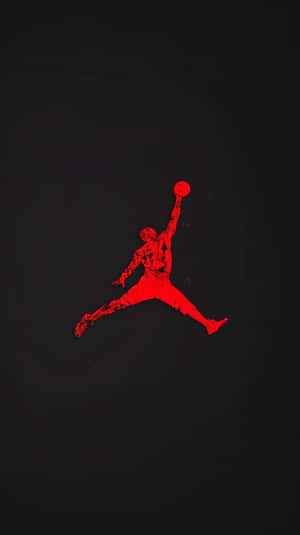 Red Jumpman Silhouetteon Black Background Wallpaper