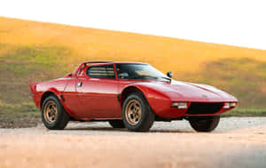 Red Lancia Stratos Classic Side View Wallpaper