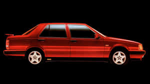 Red Lancia Thema Side View Wallpaper