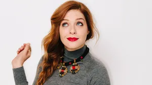 Red Lipped Womanin Grey Turtleneck Wallpaper