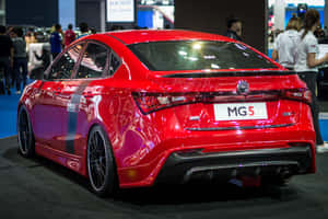 Red M G5 Sports Sedan Rear View Wallpaper
