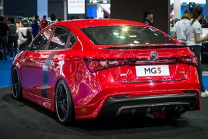 Red M G5 Sports Sedan Rear View Wallpaper