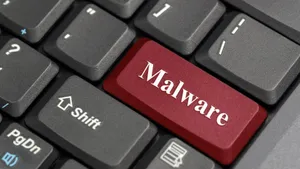 Red Malware Key On Laptop Keyboard Wallpaper