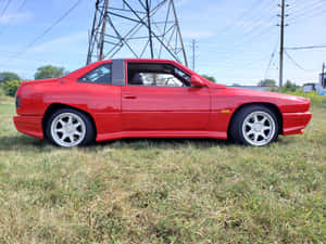 Red Maserati Shamal Side View Wallpaper