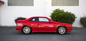 Red Maserati Shamal Side View Wallpaper