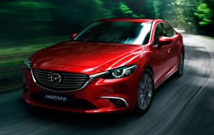 Red Mazda 6 In Motion Wallpaper