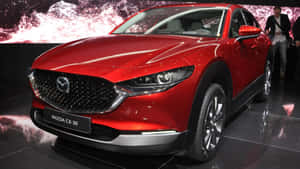 Red Mazda C X30at Auto Show Wallpaper