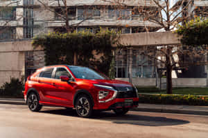 Red Mitsubishi Eclipse Cross Urban Setting Wallpaper