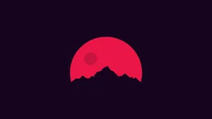 Red Moon Over Mountain Peaks Wallpaper