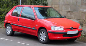 Red Peugeot106 Side View Wallpaper