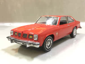 Red Pontiac Ventura Diecast Model Wallpaper