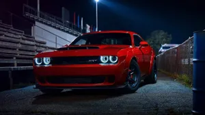 Red S R T Muscle Car Night Scene Wallpaper