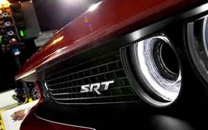 Red S R T Vehicle Grilleand Headlight Wallpaper