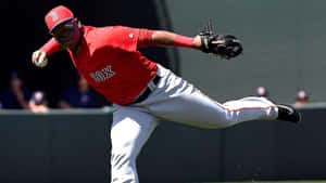 Red Sox Player In Action During Game Wallpaper