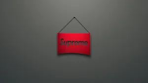 Red Supreme Logo On Gray Wallpaper