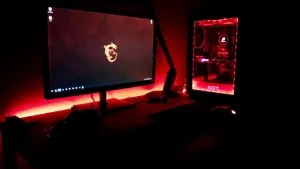 Red Themed Gaming Setup Wallpaper
