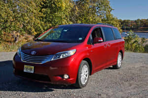 Red Toyota Sienna Minivan Outdoors Wallpaper