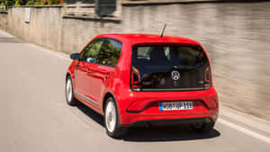 Red Volkswagen Up Motion Wallpaper