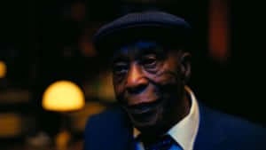 Reflective Elderly Man Wallpaper