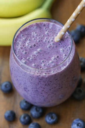 Refreshing And Delicious Blueberry Smoothie Wallpaper