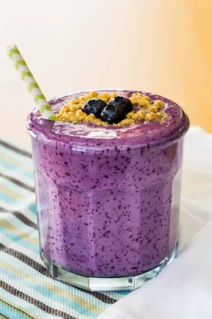 Refreshing Blueberry Smoothie On A Sunny Day Wallpaper