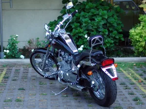 Regal Raptor Motorcycle In Action Wallpaper