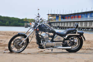 Regal Raptor Motorcycleon Beach Wallpaper