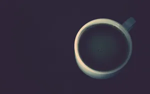 Relax With A Hot Cup Of Black Coffee Wallpaper