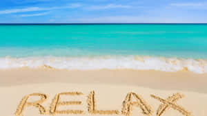 Relax Written On Sandy Beach Summer Vibes Wallpaper