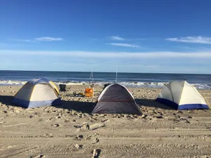 Relaxing Beach Camping Adventure Wallpaper