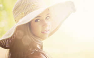 Relaxing Beach Day With A Stylish Hat Wallpaper