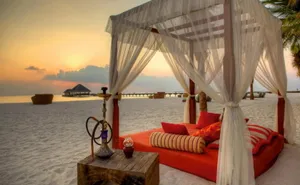 Relaxing Beach Daybed Retreat Wallpaper