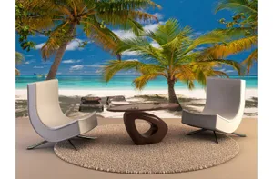 Relaxing Beach Sunbed Facing The Ocean Wallpaper