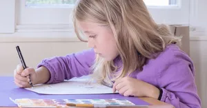 Reluctant Girl Answering Homework Wallpaper