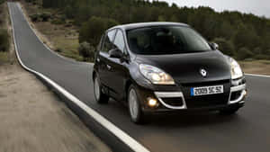 Renault Scenic2009 Model On Road Wallpaper