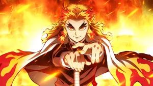 Rengoku's Fiery Sword Unleashed Wallpaper