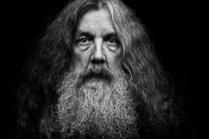 Renowned British Comic Book Author Alan Moore At A Public Event Wallpaper