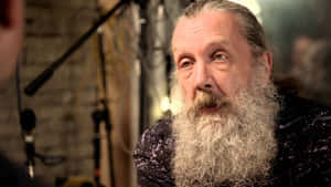 Renowned Writer Alan Moore At An Event Wallpaper