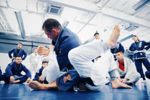 Renzo Gracie Conducting A Brazilian Jiu-jitsu Training Session Wallpaper