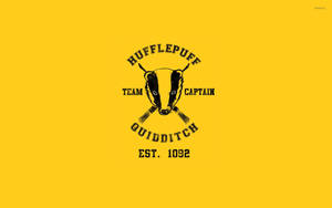 Representing Hufflepuff In A Thrilling Quidditch Match Wallpaper