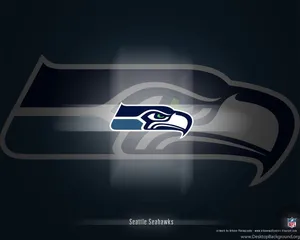 Representing Seattle: The Seattle Seahawks Ready For Action Wallpaper