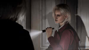 Resident Evil Requiem Claire Flashlight Scene Wallpaper